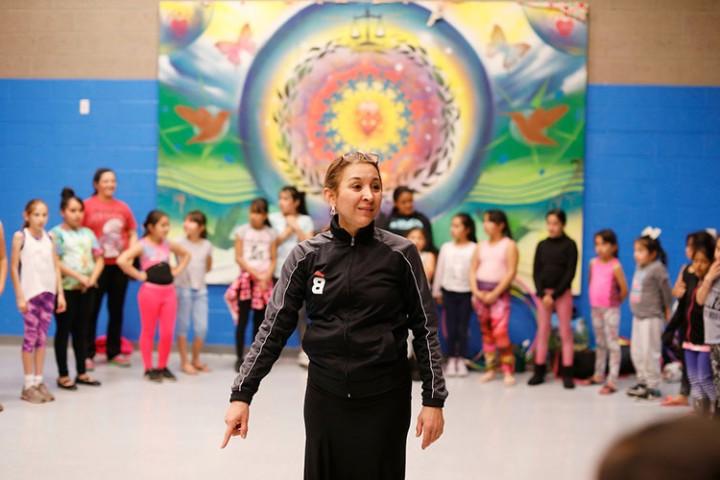 teacher teaching ballet hispanico